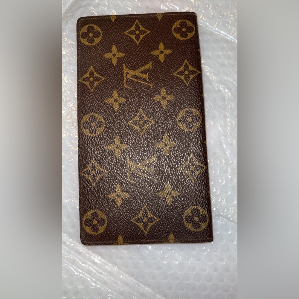 Authentic Louis Vuitton Cheque /Passport wallet in monogram